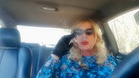 Mature Blonde GILF smoking long cigarettes while driving her car