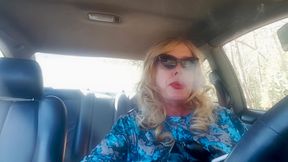 Mature Blonde GILF smoking long cigarettes while driving her car