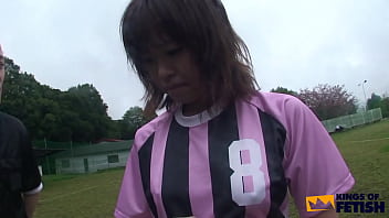 Japanese football player gives a deep foot job and sucks her couch big dick