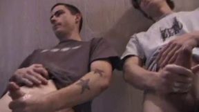 In this hot dual jerk off scene, Dan and Jayden get naked and start beating off over a glass table. The camera is positioned underneath the glass, capturing all the stroking action, and cum that shoots from their cocks.