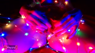 Snow Maiden brings herself to orgasm in Christmas lights