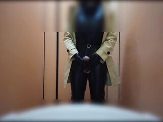 sissy latex trench coat masturbate public lavatory