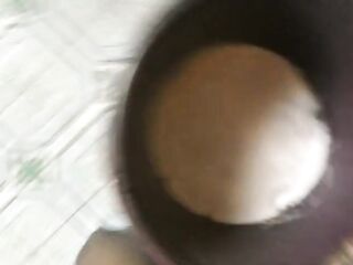 NPETITE NASTY TEEN URINATING IN THE BUCKET