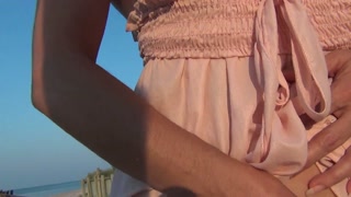 Horny Brunette Nympho Plays With Her Meaty Pussy on the Beach With People Watching