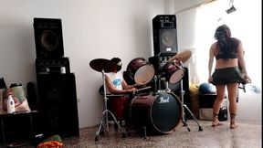 He Play the Drums for Her - She Dances, Stripping and Showing Her Ass