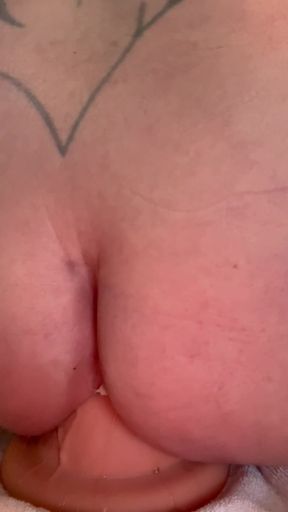 Chubby amateur plays with an anal dildo
