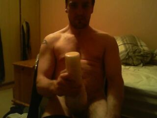 Sitting on chair watching porn fucking a felsh light till I ejaculate