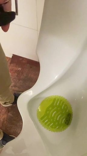 Amateur Redhead Guy Caught Pissing in a Public Toilet's Urinal - He Then Quickly Plays with His Cock Before Leaving