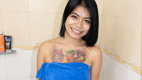 BIG-TITTED THAI BIMBO WASHES HER BIG JUICY UDDERS