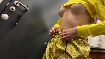 Risky public fuck in the fitting room of the store