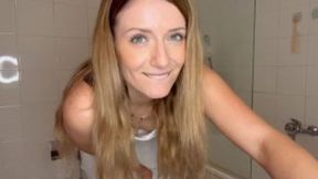 Toilet fetish on a white dress, heels and garters