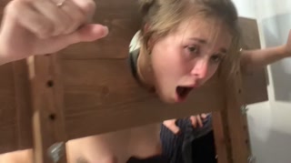 They chained a careless baby and fucked her in two holes