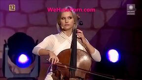 Violinists show upskirt oops as they perform live