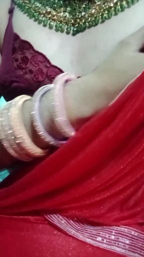 Indian Gay Crossdresser Bottom Gaurisissy Pressing Her Big Boobs and Feeling Horny in Red Saree with Heavy Jwellery