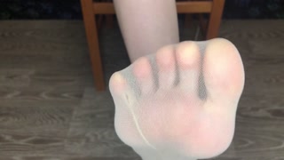 Student girl in nylon socks show foot and femdom domination