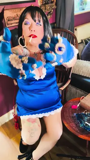 British mature Tina Snua indulges in her smoking fetish while wearing