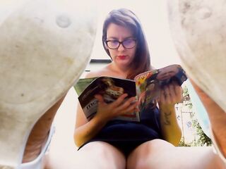 A charming giantess makes u spy on her large feet in the garden spying on her all the time!