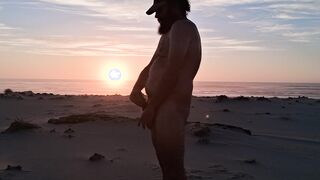 Splendid sunset on a public beach