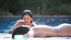 lesbian brunettes scissor and eat pussy by the pool
