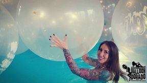 Megan pops a lot of 40 Inch Boom Balloons with her Fingernails in the Pool 4K UHD Version