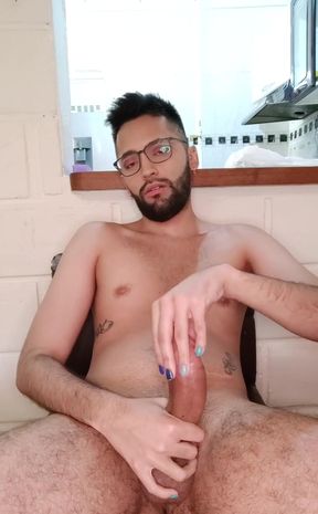 Jerking my big uncut cock with lube until I cum