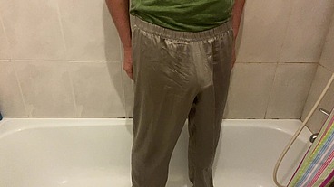 Boy pees in his pajamas