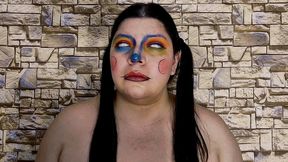 Clown with pigtails rolling eyes