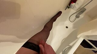 Masturbating with black nylon stockings on my leg