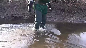 Crossing a riverr in greenwaders