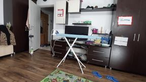 Sexy brunette doing naked chores around the house.