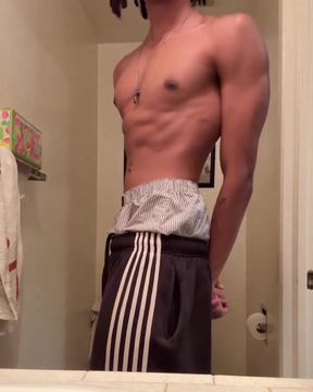 Graduated twink shows off his physique in solo pose