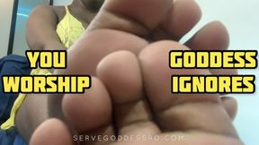 worship Goddess's feet while She ignores you on cam