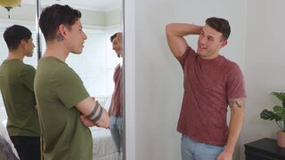 Tattooed lad with a cute face is giving a nice handjob