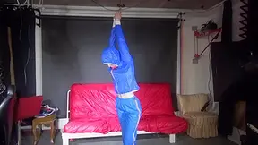 Sexy Sonja Being Tied And Gagged Overhead With Ropes Wearing A Sexy Blue Shiny Nylon Pants And A Jacket (Video)