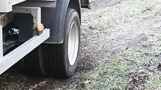 barefeet camper driving flipping tires offroad. burnout smoking tires pedal pumping revving