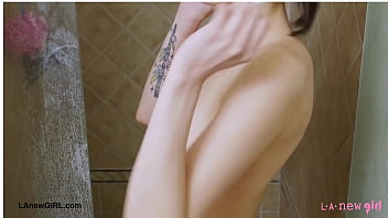 Charming dark-haired model took a shower
