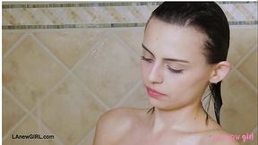 Charming dark-haired model took a shower