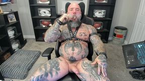 jason collins kicking back and smoking a cigar in leather with a raging hard-on!!!