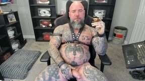 jason collins kicking back and smoking a cigar in leather with a raging hard-on!!!
