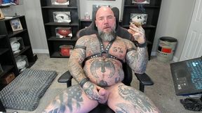 jason collins kicking back and smoking a cigar in leather with a raging hard-on!!!
