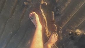 Getting my feet dirty in the wet sand