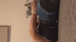 Crossdresser in hogtied denin shorts