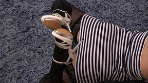 A milf masturbates with a high-heeled shoe and cums. Foot fetish and hairy pussy. Amateur.
