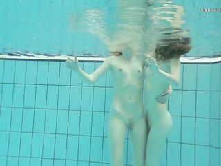 Enjoy them stripping sexy girlfriends Nastya and Libuse in the pool