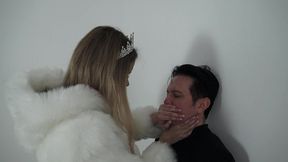tall princess kelly cslave bobby against the wall.