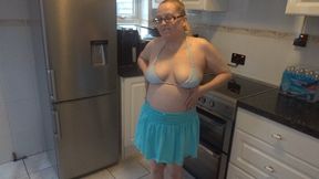 MILF Dancing and stripping in mini skirt and bikini top