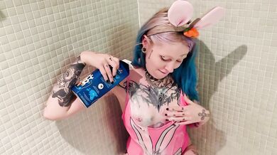 Blue haired goth girl milking silicone tits at Easter solo