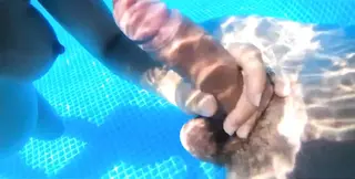 Pregnant MILF shows huge natural tits as she gives a sloppy blowjob by the