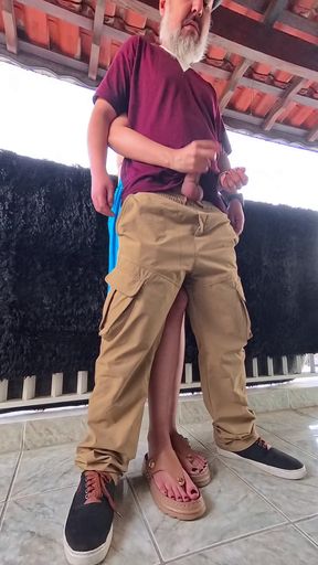 Playing secretly on the balcony during a boring party.