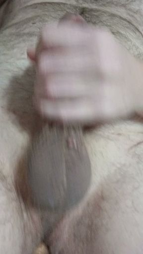 Stroking my cock with a dildo in my ass